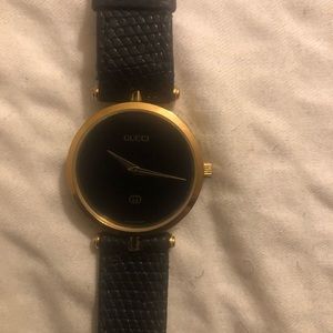 Gucci gold watch with alligator strap